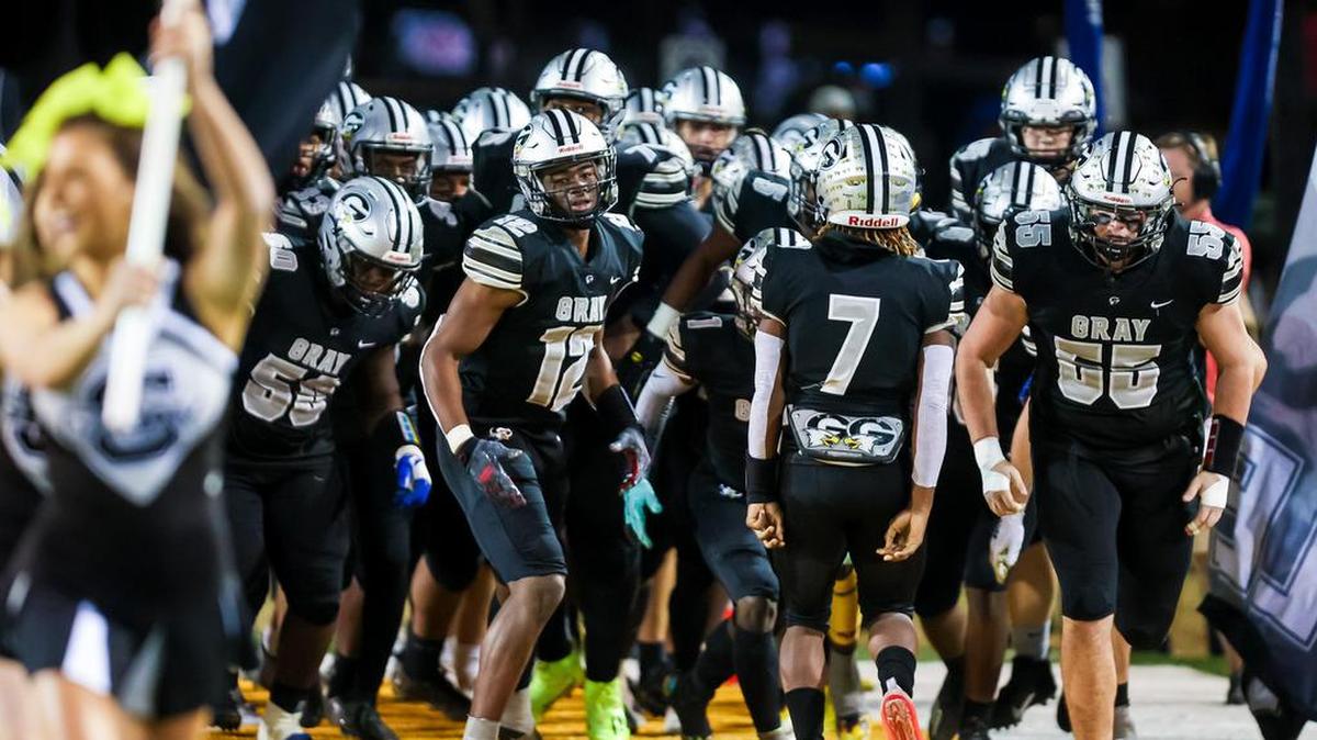 Gray Collegiate War Eagles players enter the field before the game against the Silver Bluff Bulldogs in the Class 2A SC State Championship Game at Benedict College in Columbia, SC, Friday night, December 3, 2021.