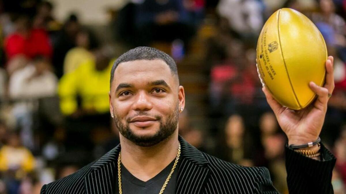 Former Lower Richland football Richard Seymour, who won three Super Bowls with the New England Patriots, is presented with a golden football as part of an NFL program honoring the high schools of Super Bowl participants in 2016. Seymour is one of modern era finalists for the Pro Football Hall of Fame.
