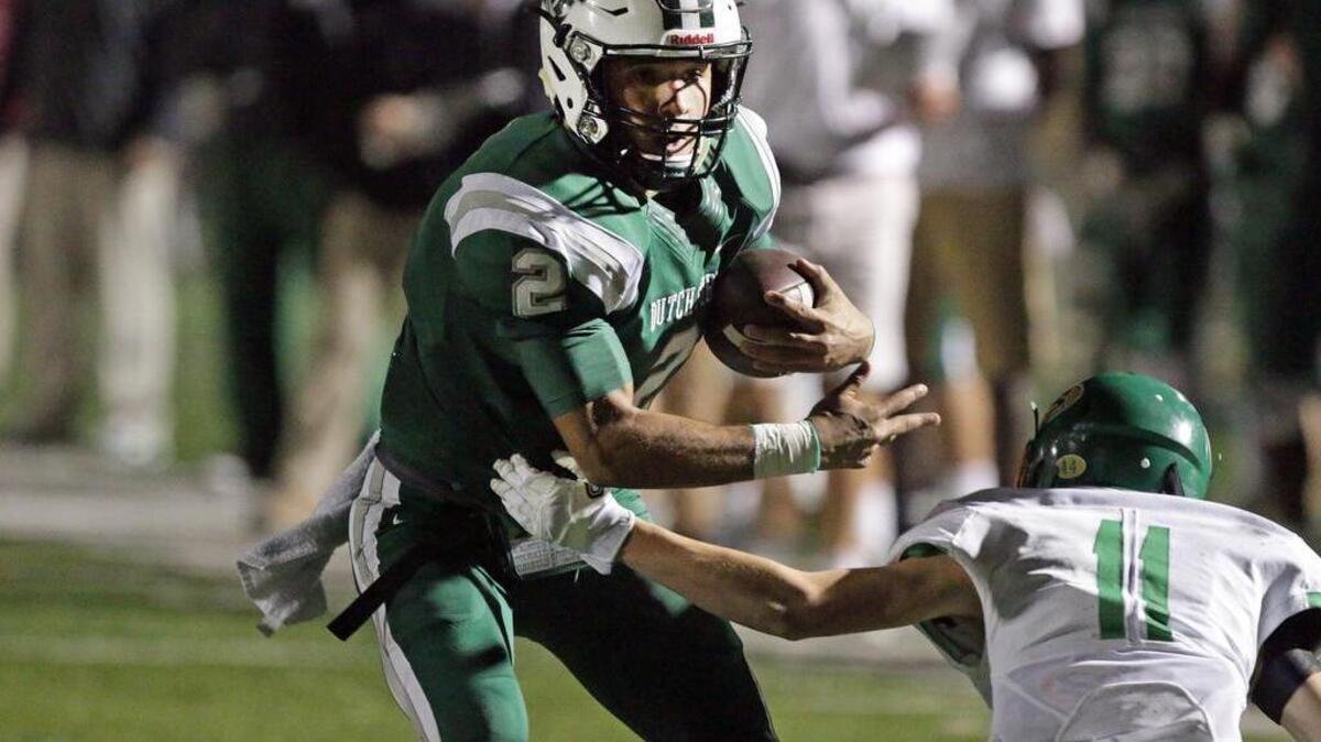 Dutch Fork quarterback Reese Nichols scores on a keeper against Summerville on Friday night.