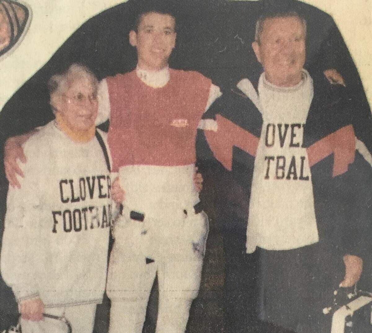 Lexington coach Perry Woolbright, middle, is with his granmother Lee and grandpa Cecil during his high school football days at Clover.