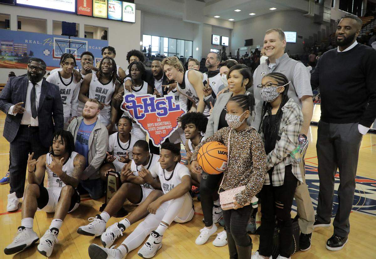 The Gray Collegiate basketball team poses for an after-game photo after defeating York Prep 56-53 Saturday at the Class 2A state championship game in Aiken.