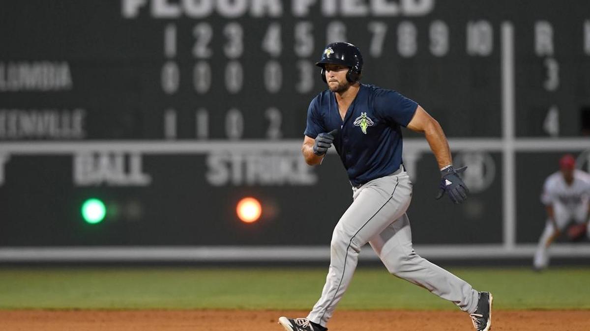 Columbia Fireflies left fielder Tim Tebow leads off second after a two-run double in Tuesday’s game against the Greenville Drive.