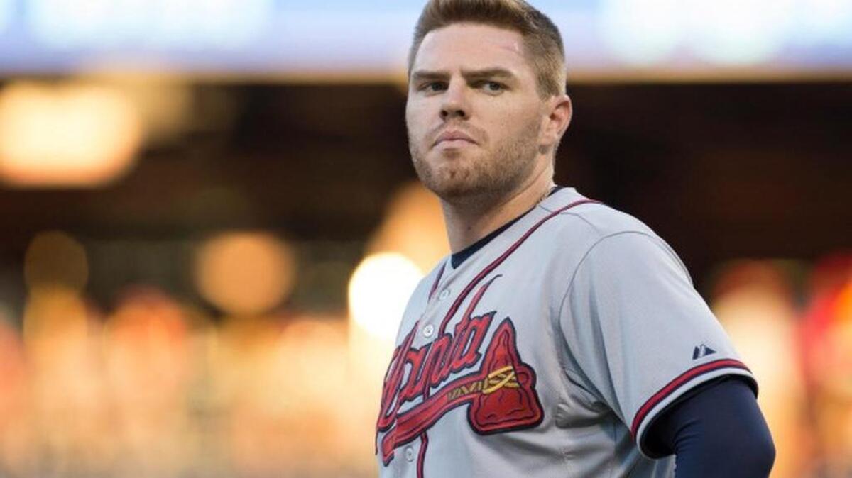 
Atlanta Braves' Freddie Freeman looks on during the first inning of a baseball game against the Philadelphia Phillies, Friday, July 31, 2015, in Philadelphia. The Phillies won 9-3. (AP Photo/Chris Szagola) 
