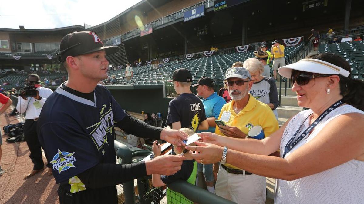 Mike Morrison signs autographs before the Celebrities versus the Soldiers softball game at Spirit Communications Park. The game was part of the festivities leading up to the 2017 South Atlantic League All-Star Game. Morrison was promoted to Winston-Salem Dash.