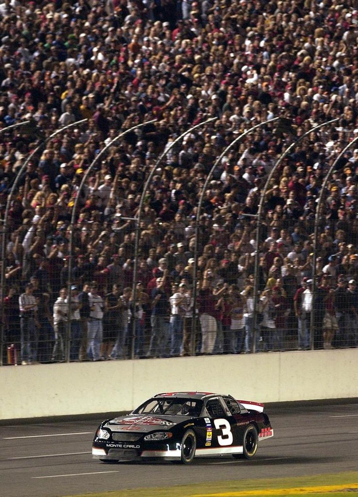 In tribute to Dale Earnhardt, team owner Richard Childress drives the No. 3 car at Lowe’s Motor Speedway in October 2003 for the first time since Earnhardt’s death.