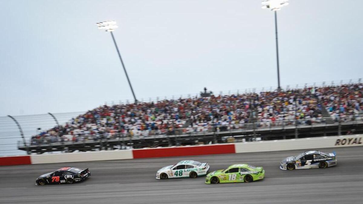 
FILE PHOTO: Cars round the track  at Darlington Raceway.
