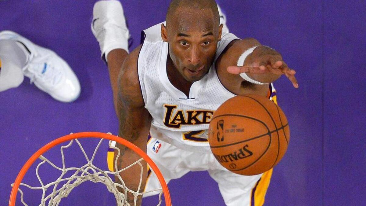 Los Angeles Lakers forward Kobe Bryant grabs a rebound during the second half of an NBA basketball game against the Detroit Pistons, Sunday, Nov. 15, 2015, in Los Angeles. The Lakers won 97-85.