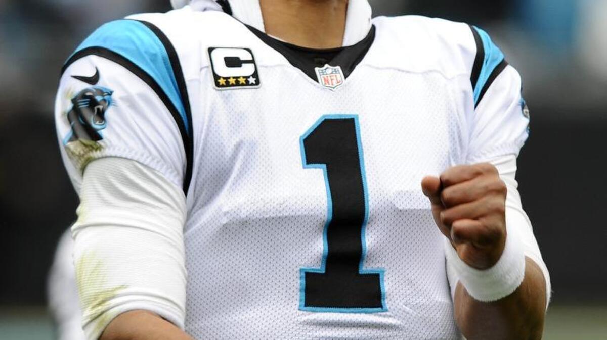Carolina Panthers' Cam Newton (1) celebrates the team's early success against the Seattle Seahawks in the first quarter of their NFC Divisional game at Bank of America Stadium on Sunday, January 17, 2016. The Panthers led 31-0 at halftime.