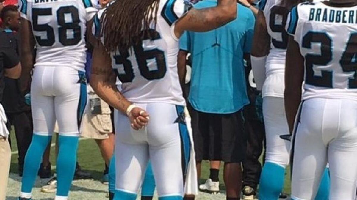 Carolina Panthers safety Marcus Ball raised his right hand high in a fist with his index finger raised during the National Anthem before Sunday’s matchup against the Minnesota Vikings. Later he posted this photo on Instagram, explaining: “In difficult and challenging times, this wonderful nation needs UNITY and LOVE. I LOVE the city of Charlotte and I LOVE my TEAM. That is what my gesture was intended to express.”