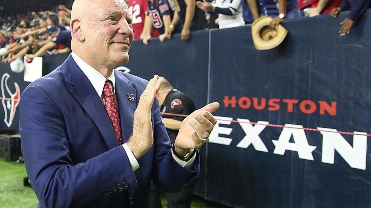 Houston Texans owner Bob McNair celebrates a Texans win at NRG Stadium.