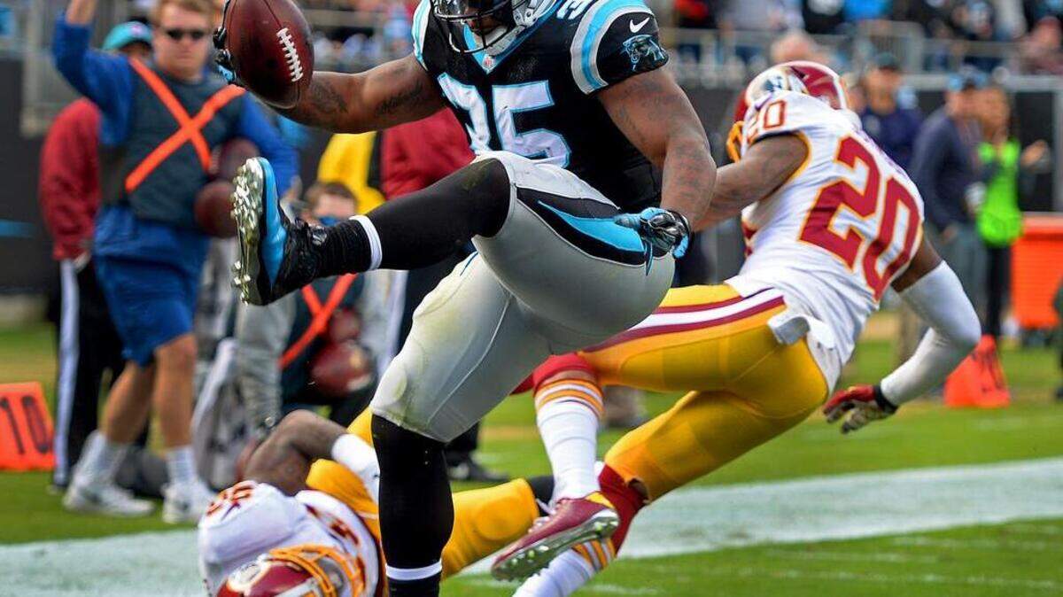 Carolina Panthers full back Mike Tolbert high steps into the end zone for a touchdown vs Washington during first quarter action at Bank of America Stadium in Charlotte, NC on Sunday.