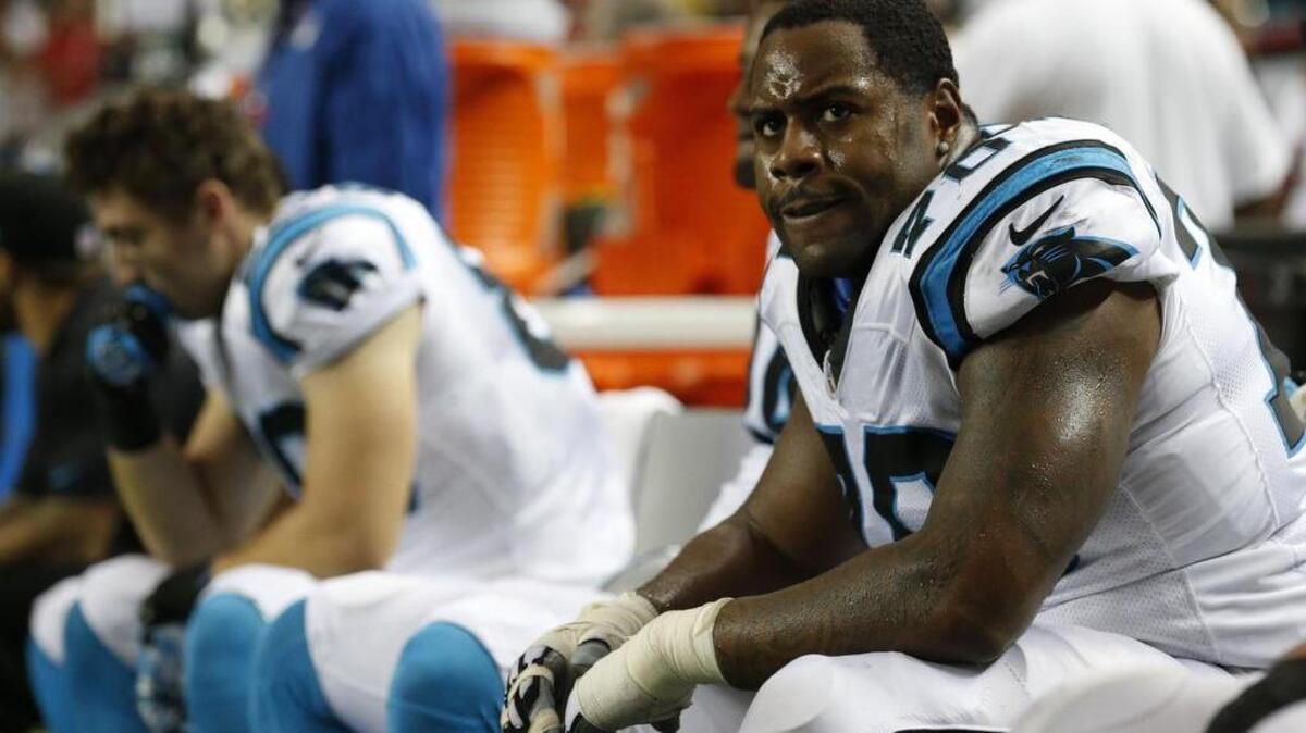 Carolina Panthers guard Trai Turner (70) reacts on the bench following the team’s 20-13 loss to Atlanta on Sunday.