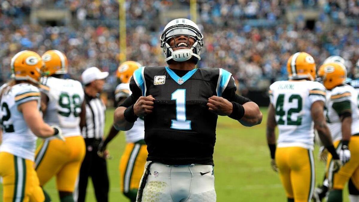 Carolina Panthers quarterback Cam Newton celebrates a touchdown against the Green Bay Packers during the second quarter on Sunday.