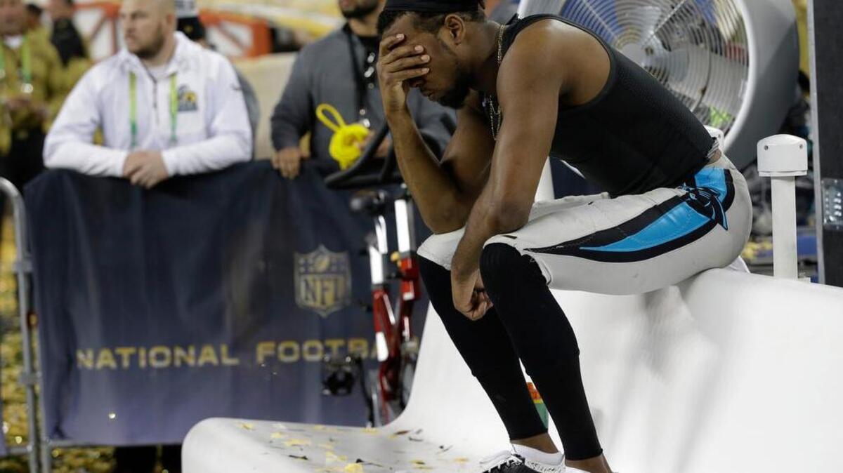 Carolina Panthers Josh Norman (24) sits on the bench after the NFL Super Bowl 50 football game against the Denver Broncos Sunday, Feb. 7, 2016, in Santa Clara, Calif. The Broncos won 24-10.