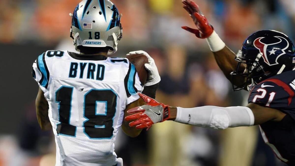 Carolina Panthers wide receiver Damiere Byrd (18) makes a touchdown catch against Houston Texans defensive back Marcus Gilchrist (21) in a preseason game.