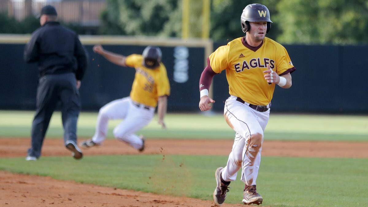 Winthrop’s Joey Tepper heads to third base