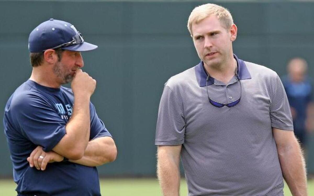 Derek Phillips, right, speaks with Rhode Island baseball coach Raphael Cerrato ahead of this weekend’s NCAA baseball regional.