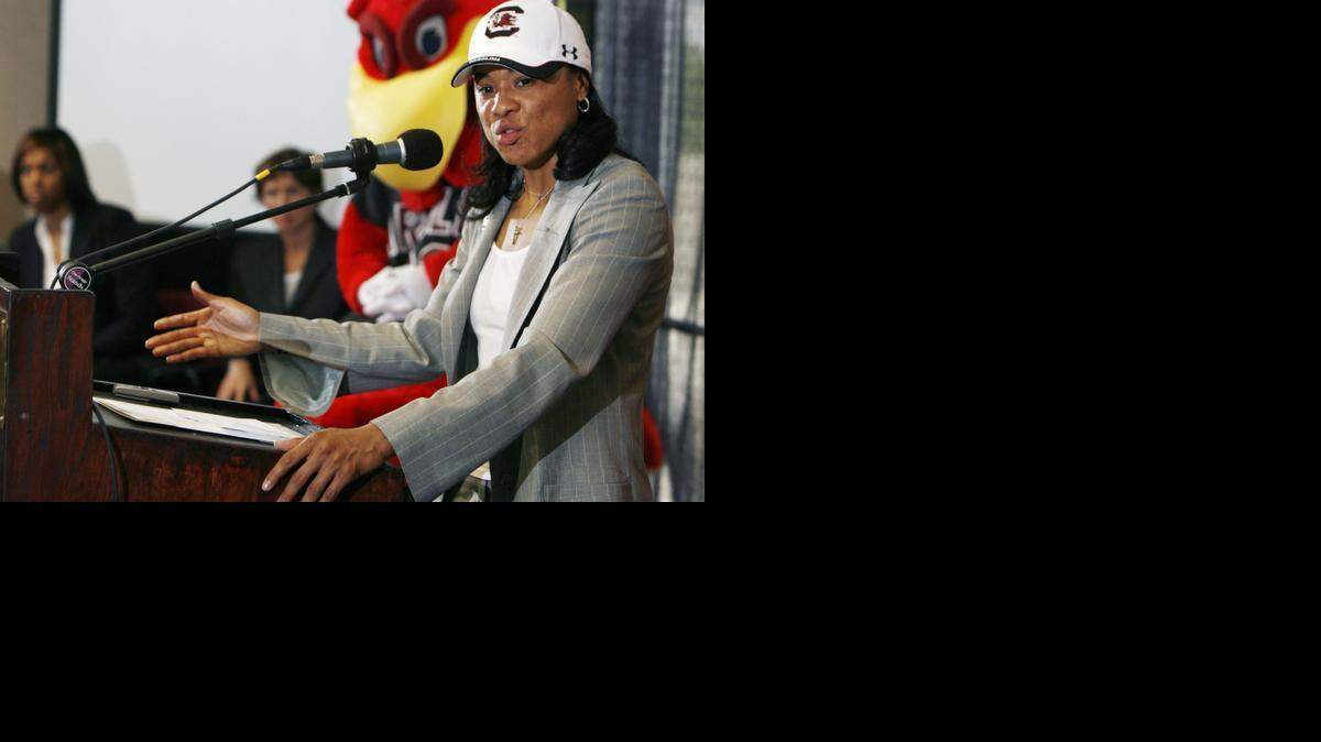 
(Saturday -- 05/10/2008 -- Columbia, S.C. -- PHOTOGRAPH BY Rich Glickstein) -- USC introduced Dawn Staley (cq) as the new women's basketball coach Saturday, May 10, 2008, during a press conference at the basketball practice facility. Staley brings a rich background in playing college and professional basketball and coaching at Temple University in her native Philadelphia. Staley talks to the crowd of media, players, staff and boosters gathered for the announcement. Photograph by Rich Glickstein
