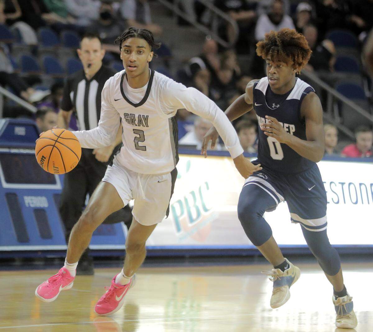 Gray’s Jalen Jefferson dribbles up the court ahead of York Prep’s Kendall Davis.